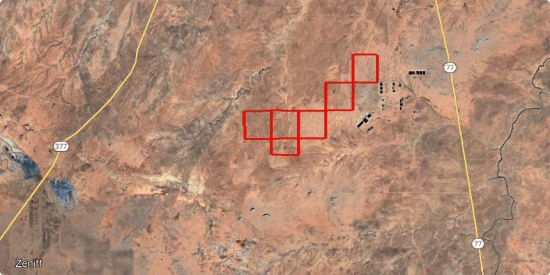 Site map over aerial image of landscape.